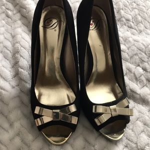 Black and gold heels